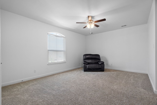 unfurnished room featuring carpet flooring and ceiling fan