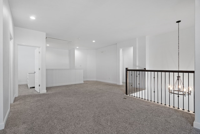 empty room with light colored carpet