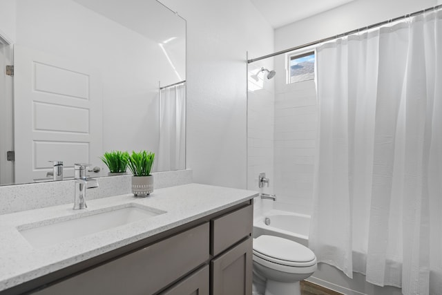 full bathroom featuring vanity, shower / bath combo, wood-type flooring, and toilet