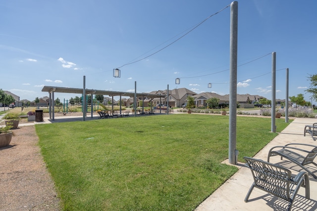 exterior space featuring a yard and a playground