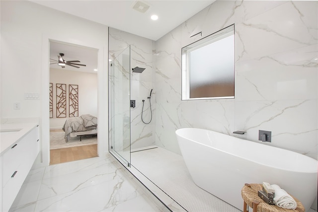 bathroom featuring vanity, shower with separate bathtub, and ceiling fan