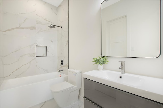 full bathroom with tiled shower / bath, vanity, and toilet