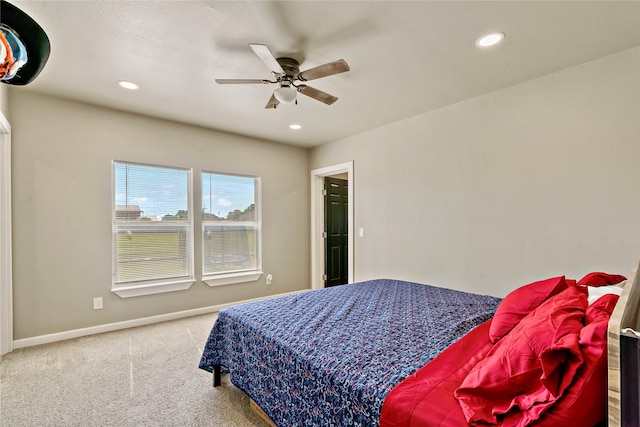 carpeted bedroom featuring ceiling fan