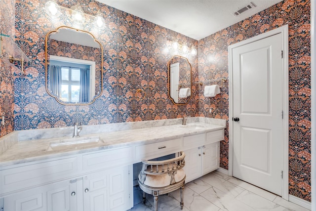 15211 Meandering Way, Dallas, TX 75248 - full bath featuring visible vents, a sink, marble finish floor, and double vanity