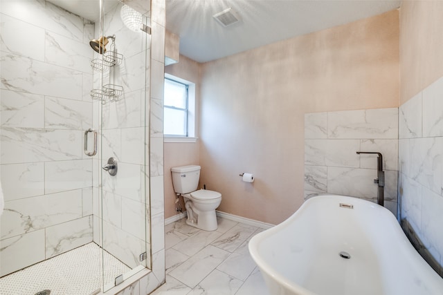 bathroom with toilet and separate shower and tub