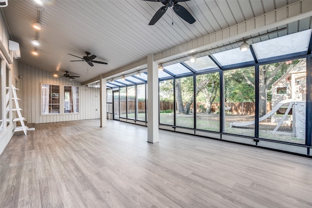 unfurnished sunroom with vaulted ceiling and wooden ceiling