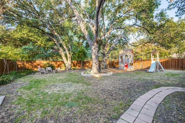 view of yard with a playground