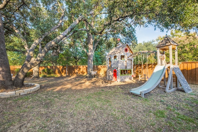 15211 Meandering Way, Dallas, TX 75248 - view of playground with a fenced backyard