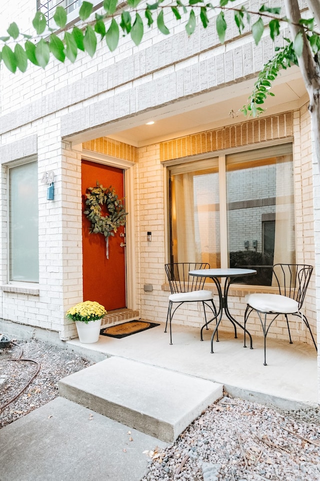 property entrance with a patio