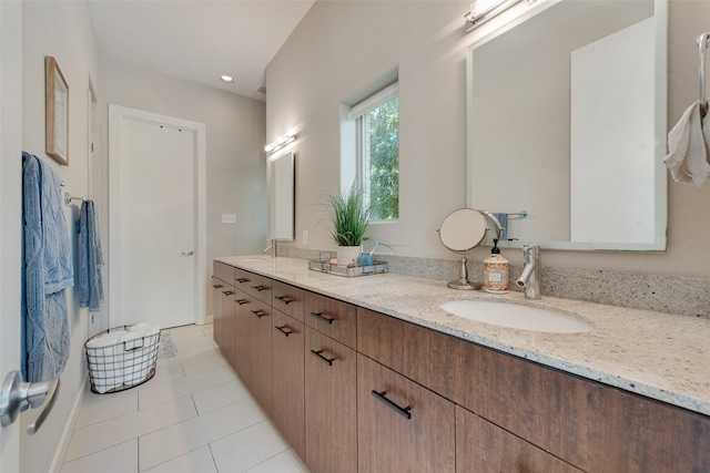 bathroom featuring vanity and tile patterned flooring