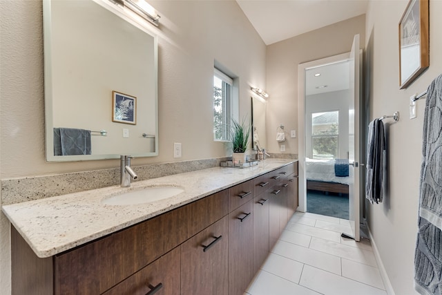 bathroom with vanity and tile patterned floors