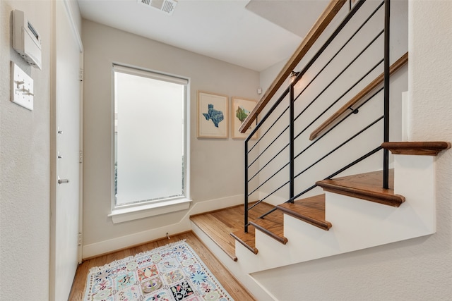 foyer with light hardwood / wood-style flooring