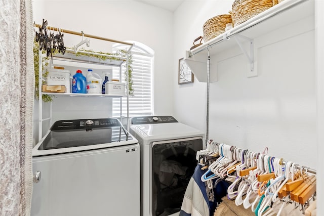 clothes washing area with independent washer and dryer