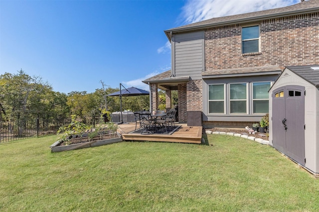 back of property featuring a yard and a deck