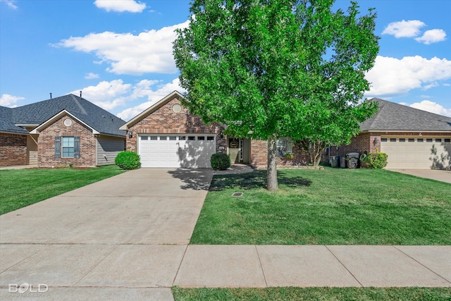 view of front facade featuring a front lawn and a garage