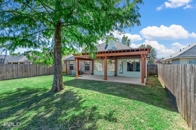 rear view of property with a patio area and a lawn