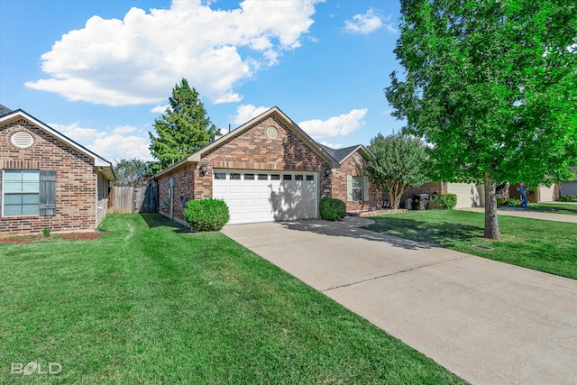 view of property with a front yard and a garage