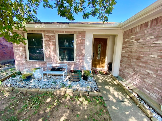 doorway to property featuring a patio area