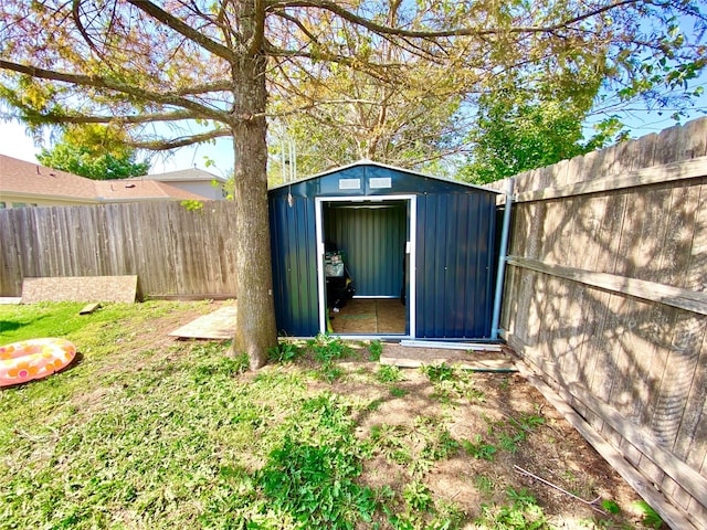 view of outdoor structure featuring a yard