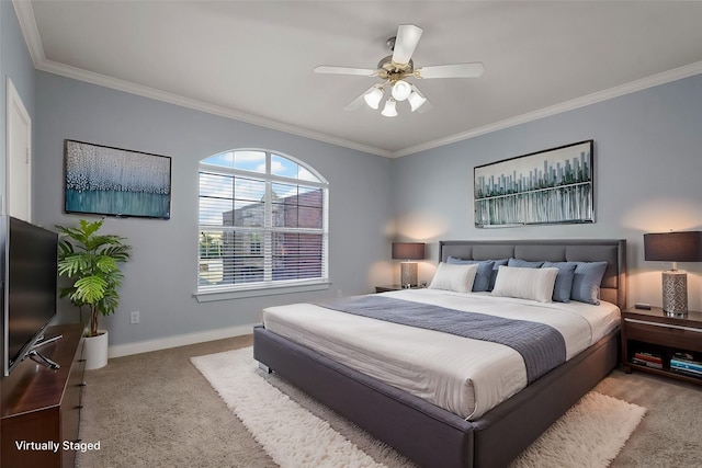 bedroom with ceiling fan, light colored carpet, and ornamental molding