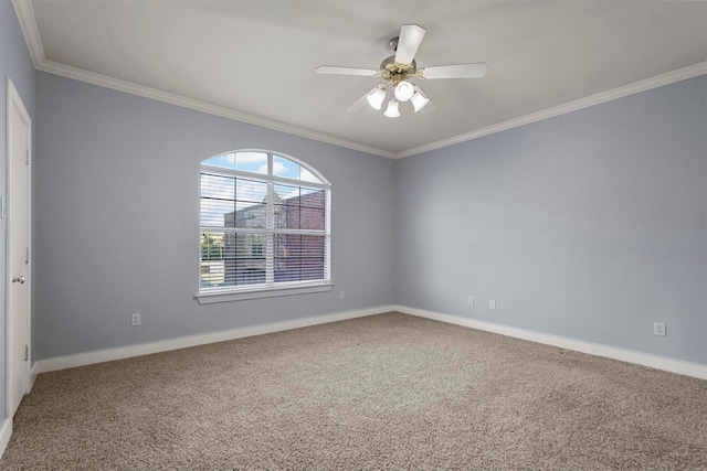 unfurnished room with carpet, ceiling fan, and ornamental molding