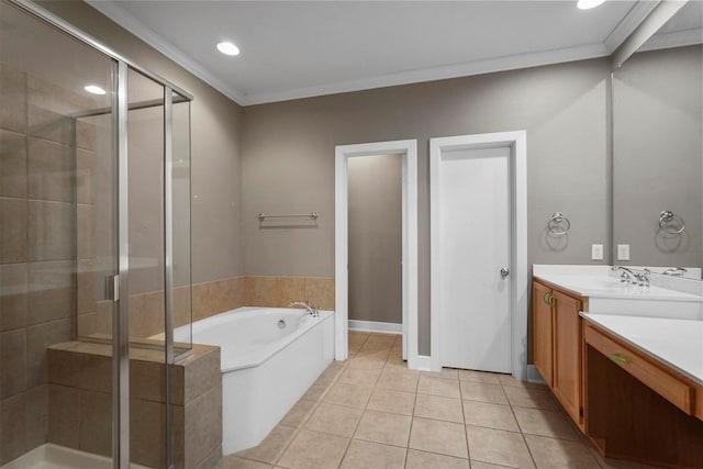 bathroom with tile patterned floors, vanity, ornamental molding, and independent shower and bath