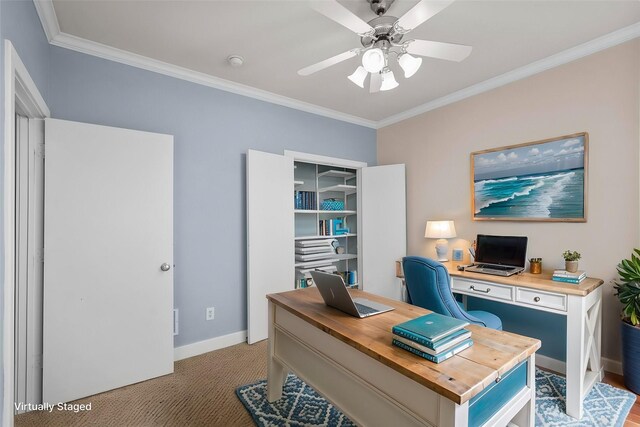 office area with crown molding, ceiling fan, and light carpet