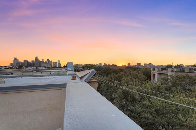 view of patio terrace at dusk