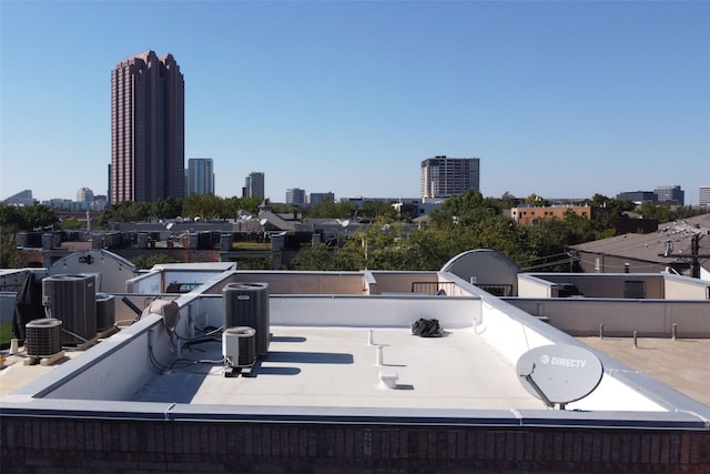 view of patio / terrace featuring a balcony and central air condition unit