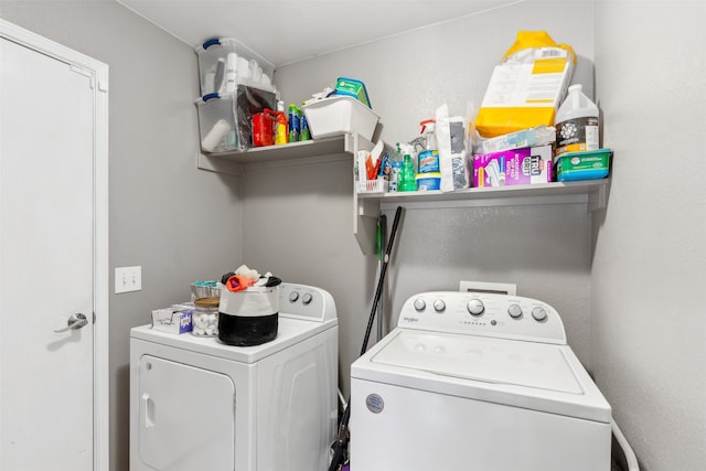 clothes washing area featuring washing machine and dryer