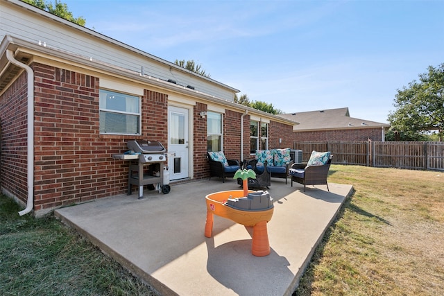 view of patio / terrace with outdoor lounge area and a grill