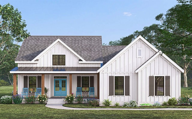 modern farmhouse style home featuring a front yard and a porch