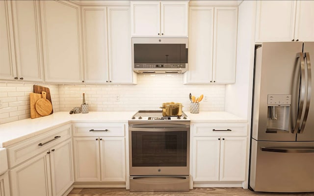 kitchen featuring light hardwood / wood-style floors, tasteful backsplash, stainless steel appliances, and light stone counters