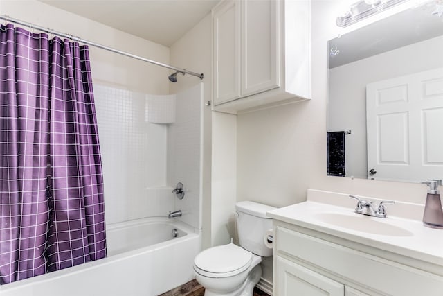 full bathroom with shower / bath combination with curtain, toilet, and vanity