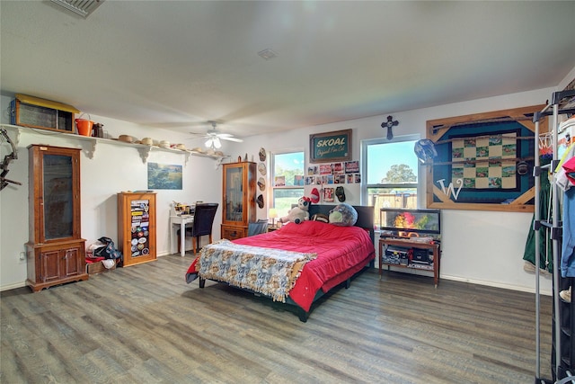 bedroom featuring hardwood / wood-style flooring and ceiling fan