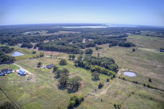 bird's eye view featuring a rural view and a water view