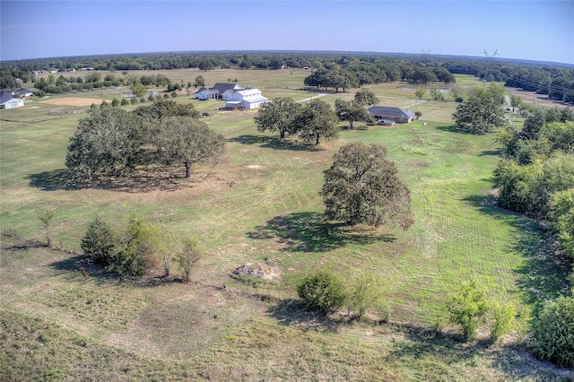 birds eye view of property featuring a rural view