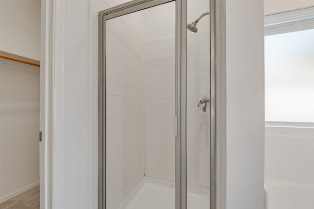 bathroom with an enclosed shower