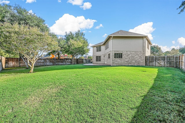 view of yard with a patio area