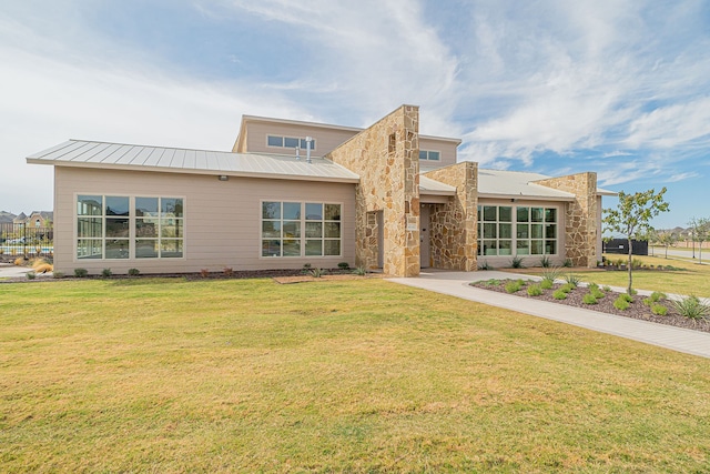 view of front of home with a front yard