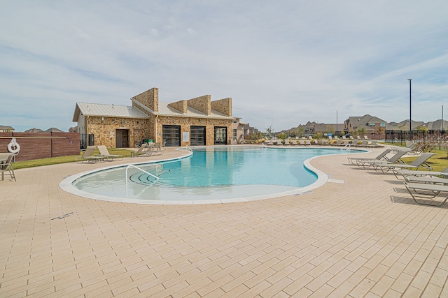 view of pool with a patio