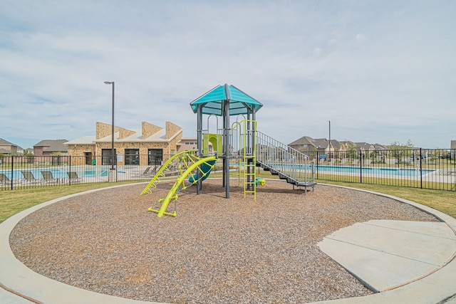 view of play area with a community pool