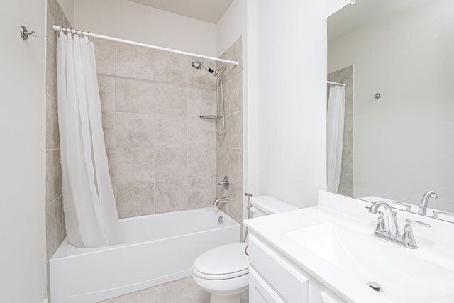 full bathroom featuring shower / tub combo with curtain, vanity, tile patterned floors, and toilet