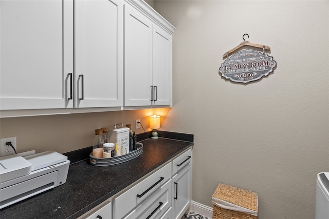 interior space featuring white cabinetry