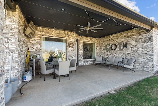 view of patio with ceiling fan