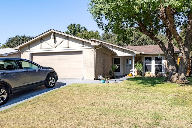 single story home featuring a front lawn and a garage