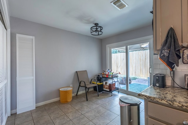 interior space with light tile patterned floors