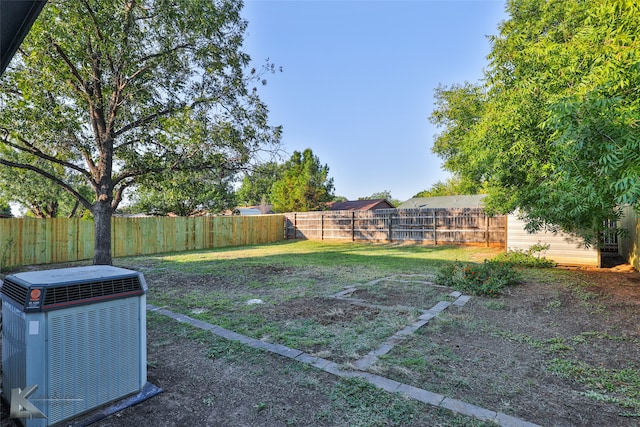 view of yard featuring central AC