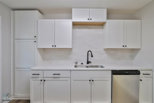 kitchen with white cabinetry, dishwasher, and wood-type flooring