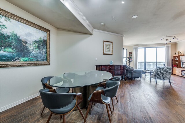 living room featuring dark hardwood / wood-style flooring and ornamental molding